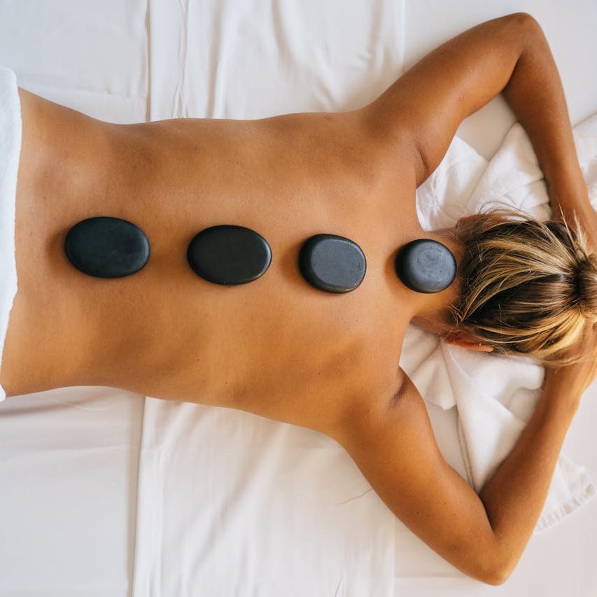 Top View of a Person with Hot Stones on their Back